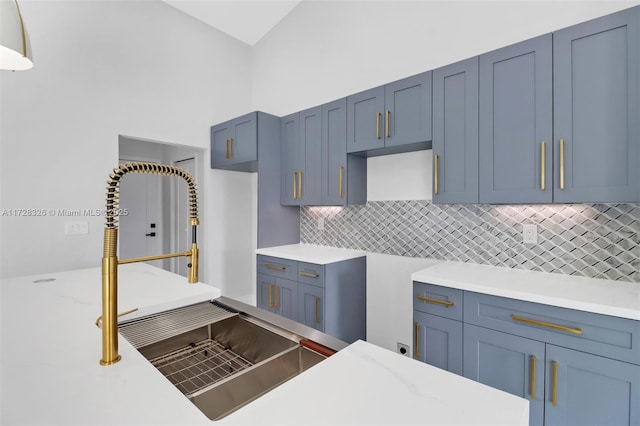 kitchen with tasteful backsplash and sink