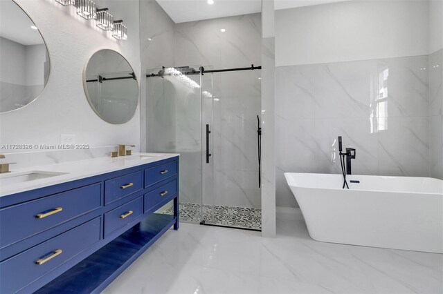 bathroom featuring vanity, tile walls, and shower with separate bathtub