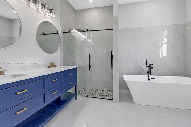 bathroom featuring vanity, plus walk in shower, and tile walls