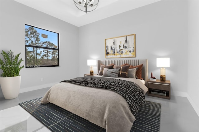 bedroom featuring concrete floors