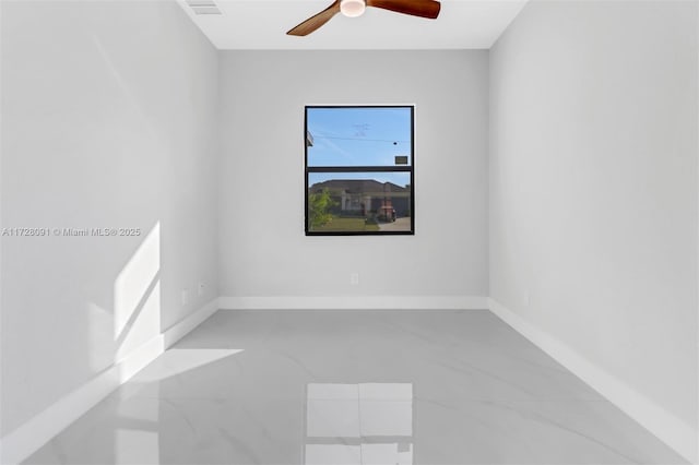 spare room featuring ceiling fan