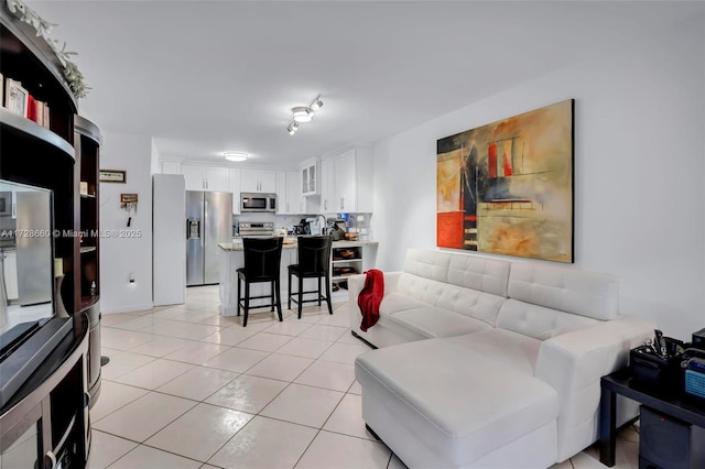 living room featuring light tile patterned floors