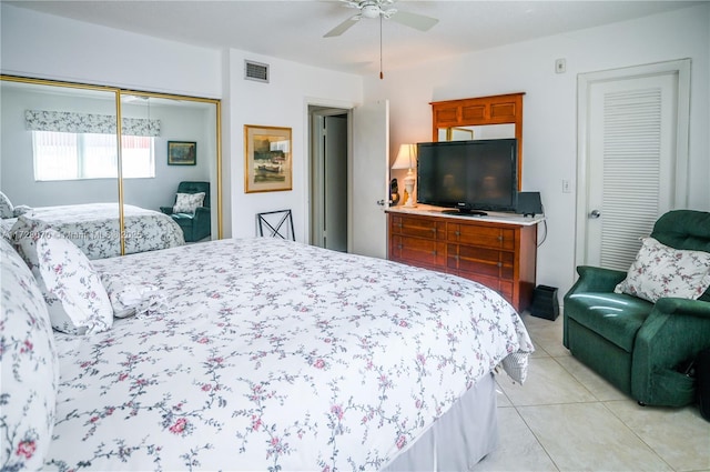 bedroom featuring ceiling fan and light tile patterned floors