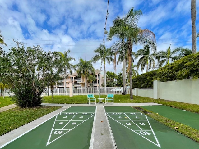 view of home's community with a lawn