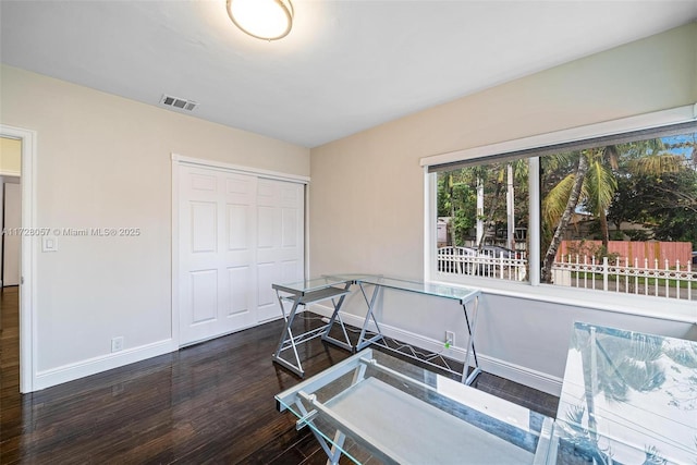 interior space with dark hardwood / wood-style floors