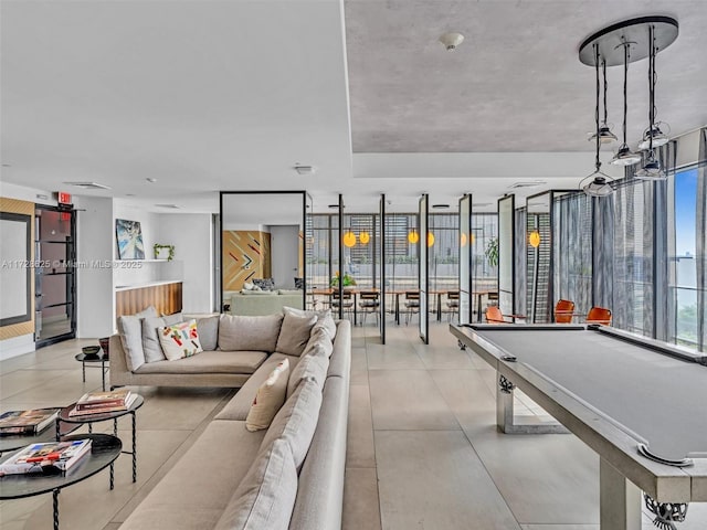 playroom with floor to ceiling windows and billiards