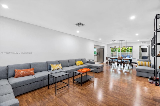 living room with hardwood / wood-style floors