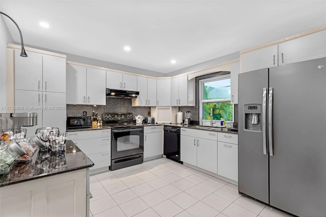 kitchen featuring white cabinetry, black appliances, and decorative backsplash