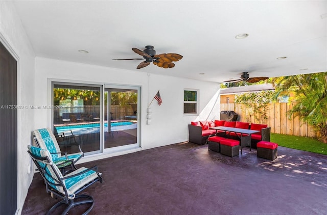 view of patio featuring ceiling fan