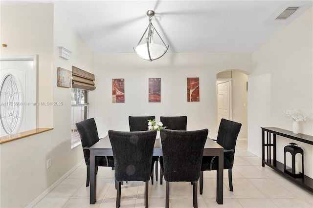 dining room featuring light tile patterned floors