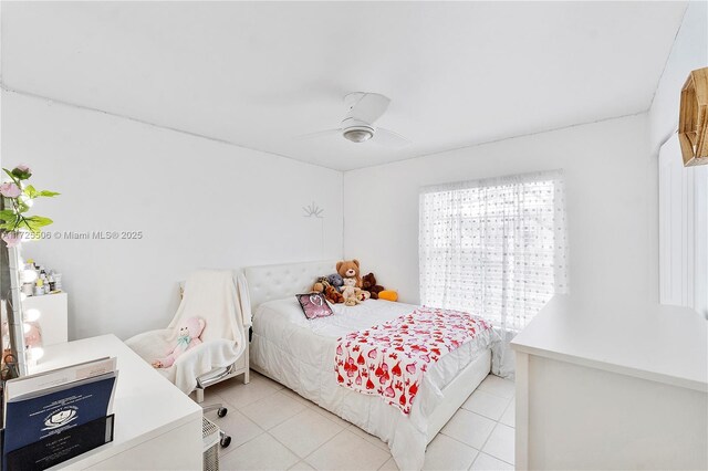 bedroom with light tile patterned flooring and ceiling fan