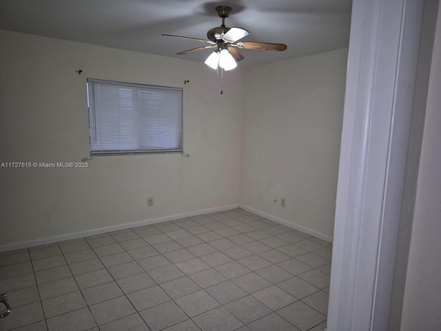 tiled empty room with ceiling fan