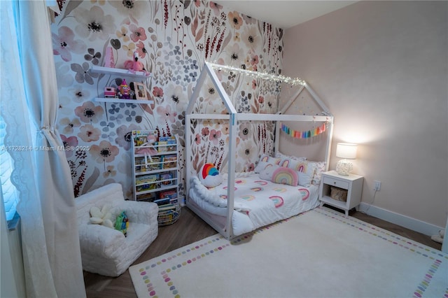 bedroom featuring hardwood / wood-style flooring