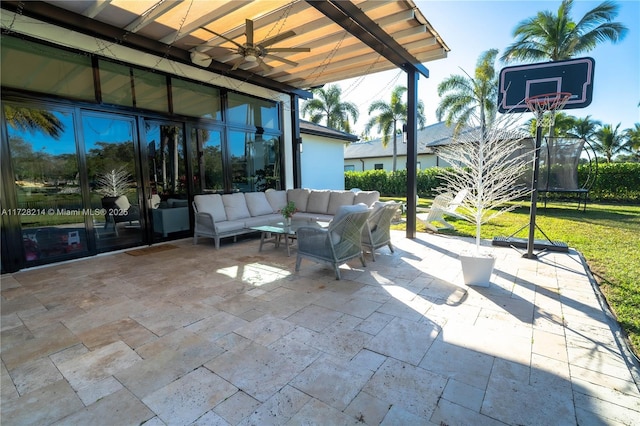 view of patio / terrace featuring an outdoor living space and ceiling fan