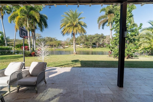 view of patio with a water view