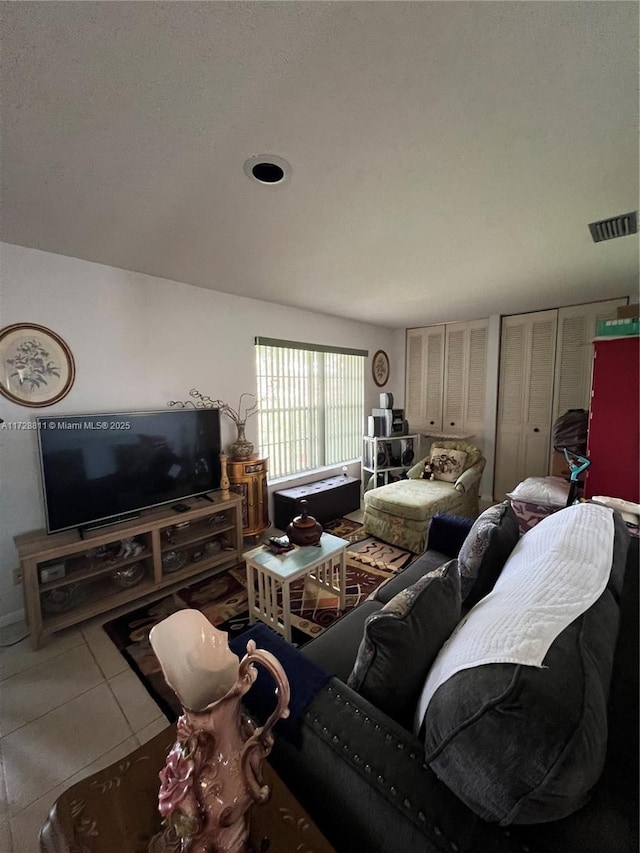 living room featuring light tile patterned flooring