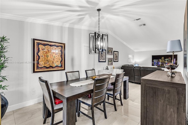 dining room featuring vaulted ceiling, light tile patterned floors, and crown molding