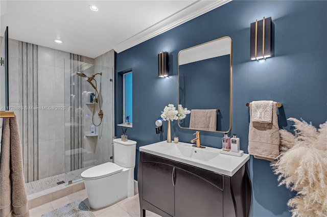 bathroom featuring toilet, vanity, tile patterned floors, crown molding, and a shower with door