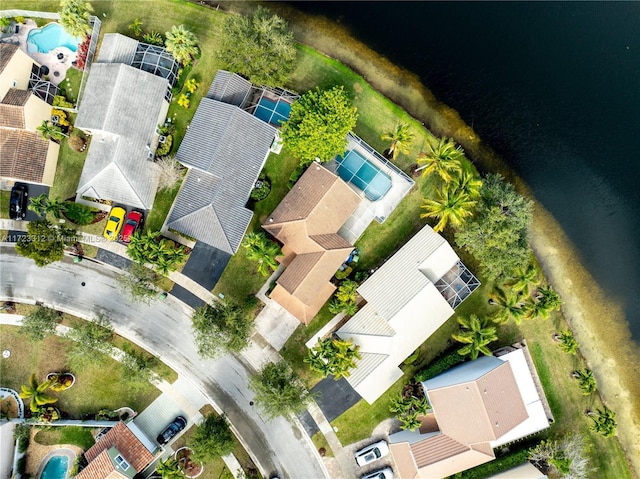 drone / aerial view with a water view