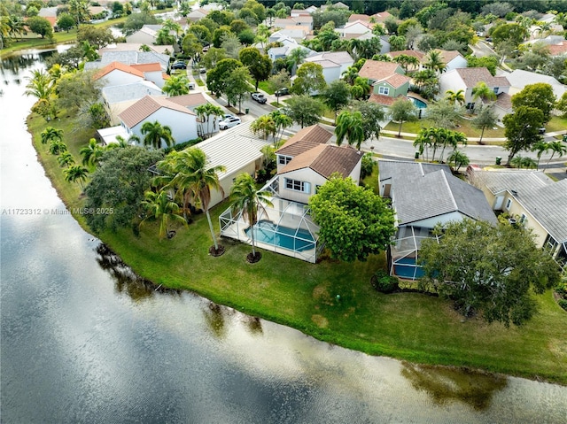 drone / aerial view with a water view