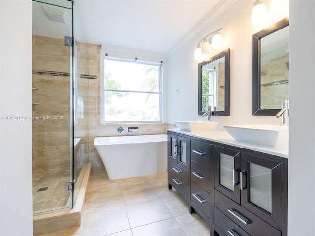 bathroom with vanity, tile patterned floors, independent shower and bath, and crown molding