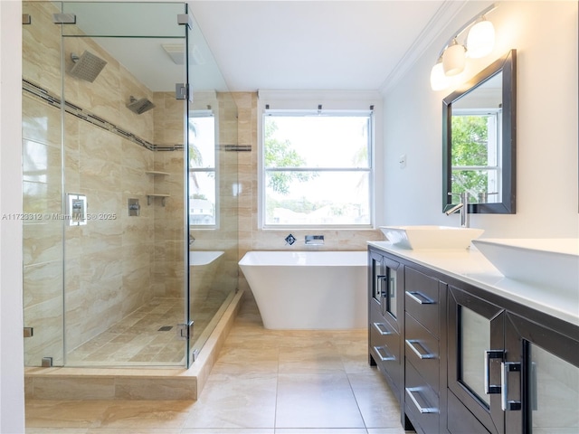 bathroom with vanity, tile walls, tile patterned floors, independent shower and bath, and ornamental molding