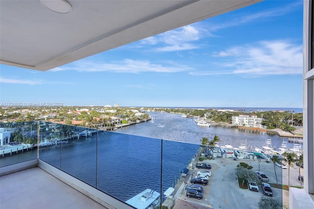 balcony featuring a water view