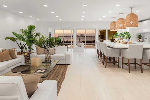 1065 N Shore Dr, Miami Beach, FL 33141 - living area with recessed lighting and light wood-type flooring