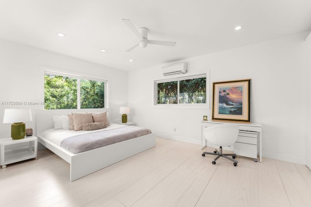 1065 N Shore Dr, Miami Beach, FL 33141 - bedroom with a wall mounted AC, recessed lighting, baseboards, light wood finished floors, and ceiling fan