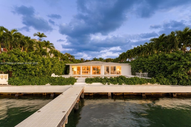 1065 N Shore Dr, Miami Beach, FL 33141 - back of property featuring a water view