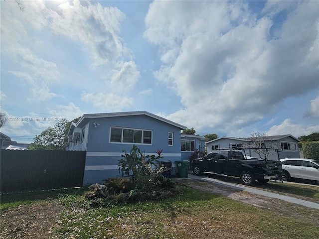 view of front of property with fence