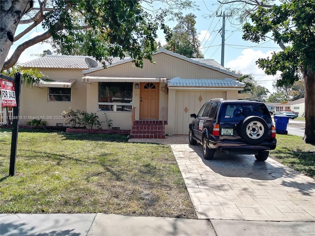 view of front of home with a front yard