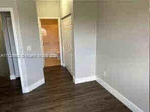 interior space featuring dark hardwood / wood-style floors