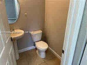 bathroom featuring toilet