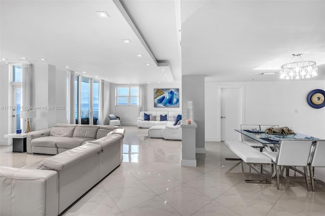 living room with a chandelier