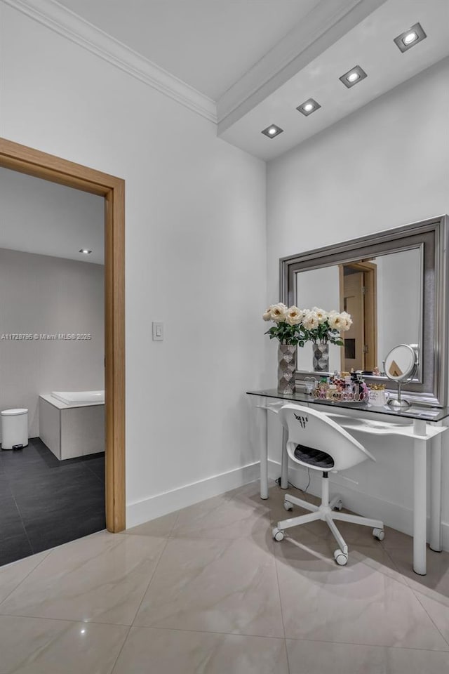 home office featuring ornamental molding and baseboards