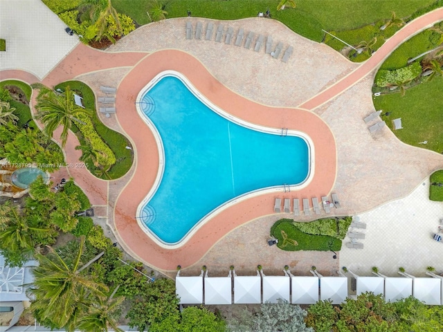 view of pool featuring fence