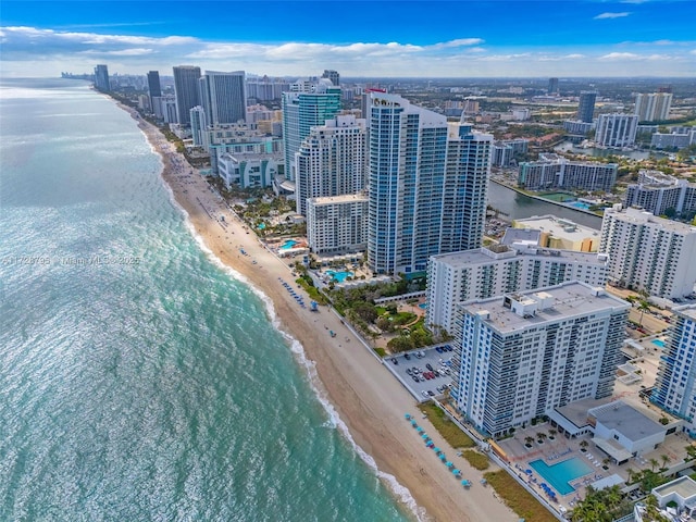 aerial view with a view of city, a water view, and a view of the beach