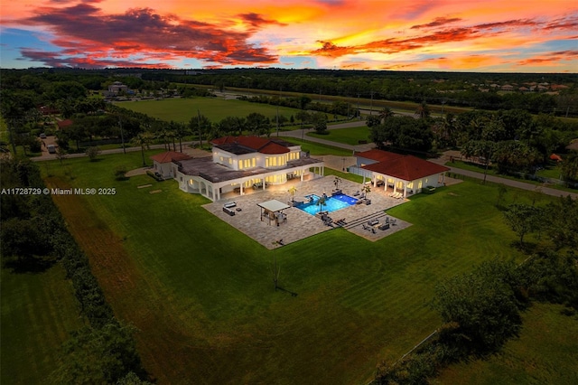 aerial view at dusk with a rural view