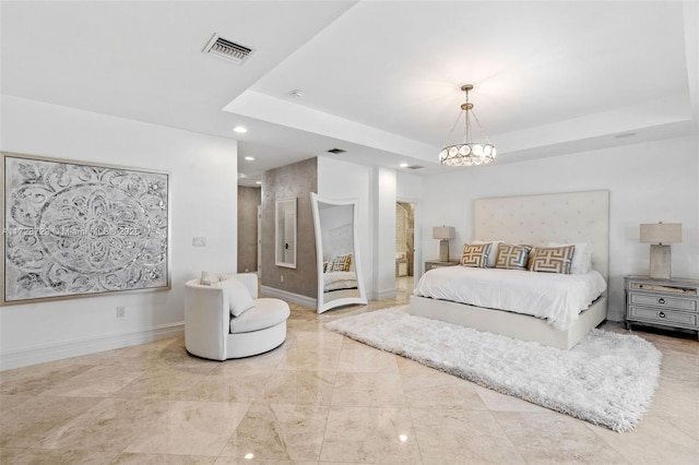 bedroom featuring a tray ceiling