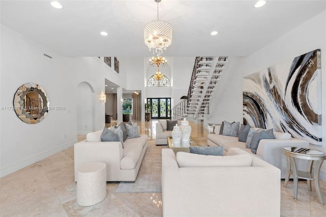 living room with a notable chandelier