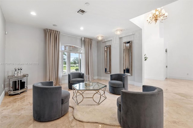 living room featuring an inviting chandelier