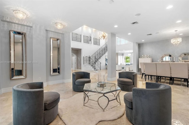 living room with an inviting chandelier