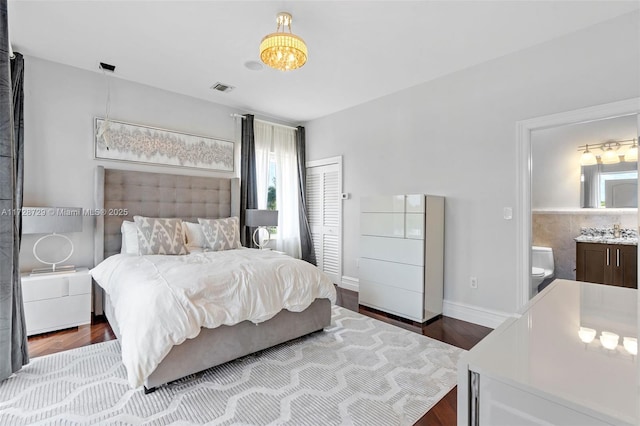 bedroom featuring wood-type flooring