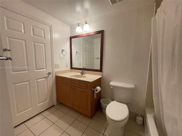 bathroom with toilet, tile patterned flooring, crown molding, and vanity