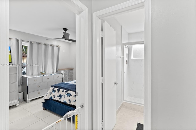 bedroom featuring ceiling fan and light tile patterned flooring