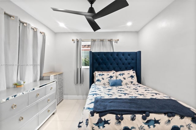 tiled bedroom with ceiling fan