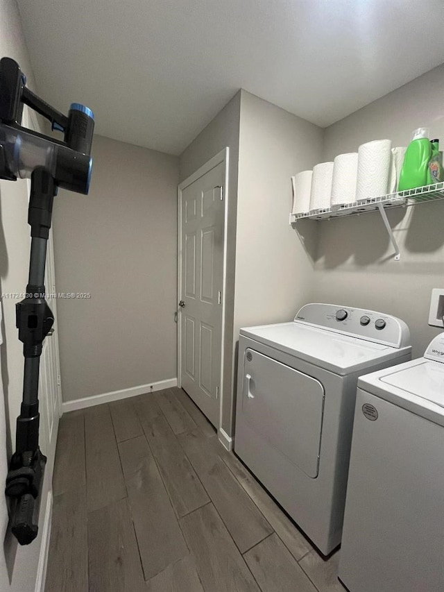 washroom featuring washing machine and dryer