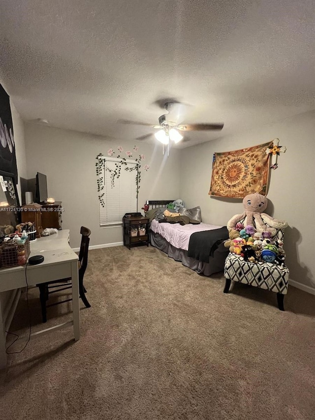 bedroom with carpet floors, a textured ceiling, and ceiling fan