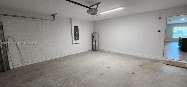 garage with electric panel, water heater, a garage door opener, and concrete block wall